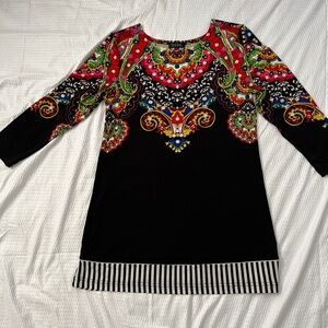 Isabel tunic or dress. 3/4 length sleeves. Round neck. Colorful design. Spandex.